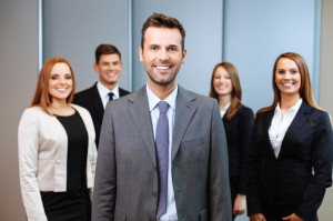 53954761 - group of business people with team leader in foreground